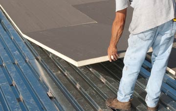 benefits of insulating Magheragall flat roofing